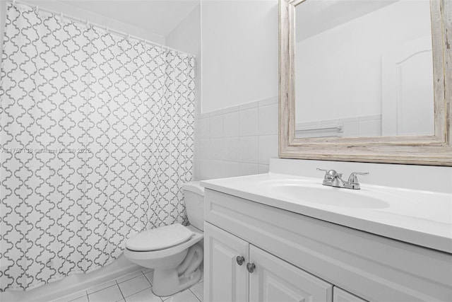 8790 SW 84th St, Miami, FL 33173 - bathroom featuring tile walls, curtained shower, toilet, vanity, and tile patterned floors