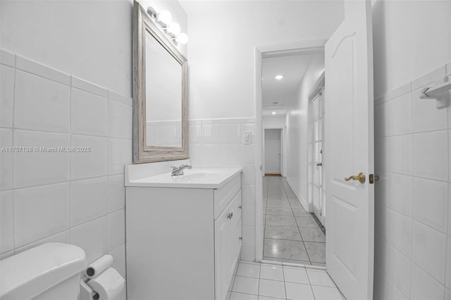 8790 SW 84th St, Miami, FL 33173 - half bathroom with vanity, tile walls, toilet, and tile patterned floors