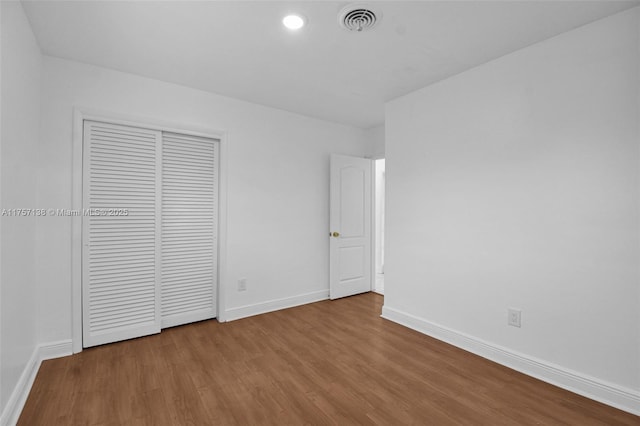 8790 SW 84th St, Miami, FL 33173 - unfurnished bedroom featuring recessed lighting, a closet, visible vents, wood finished floors, and baseboards