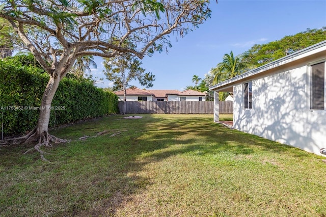 view of yard featuring fence