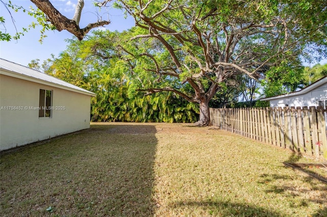 view of yard with fence