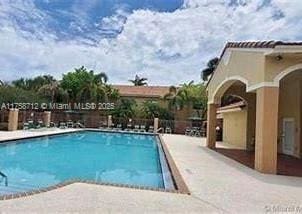 pool with a patio