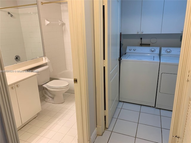 bathroom with toilet,  shower combination, tile patterned flooring, vanity, and washing machine and dryer