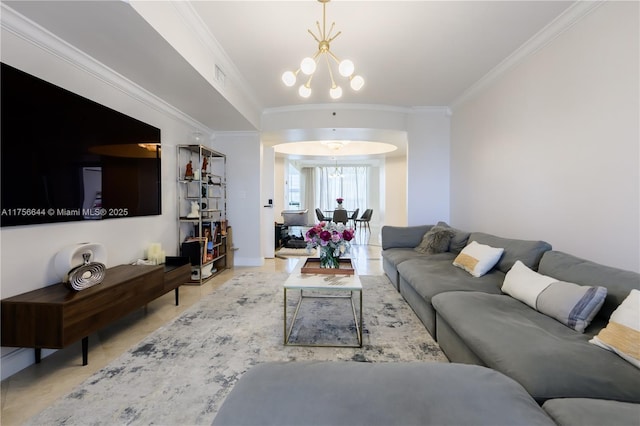 living room featuring crown molding, a notable chandelier, and visible vents