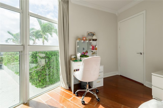 home office with crown molding, plenty of natural light, wood finished floors, and baseboards