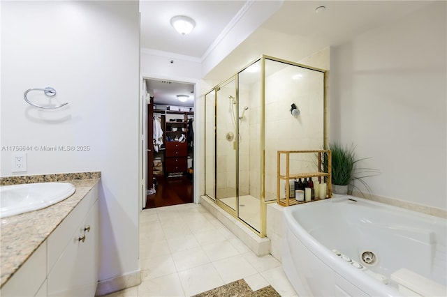 bathroom featuring tile patterned floors, a garden tub, ornamental molding, a shower stall, and vanity