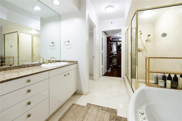 full bathroom featuring a washtub, a stall shower, vanity, and crown molding