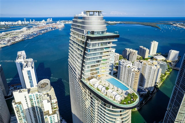 aerial view featuring a view of city and a water view