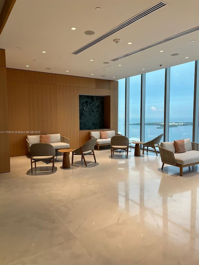 community lobby featuring a water view