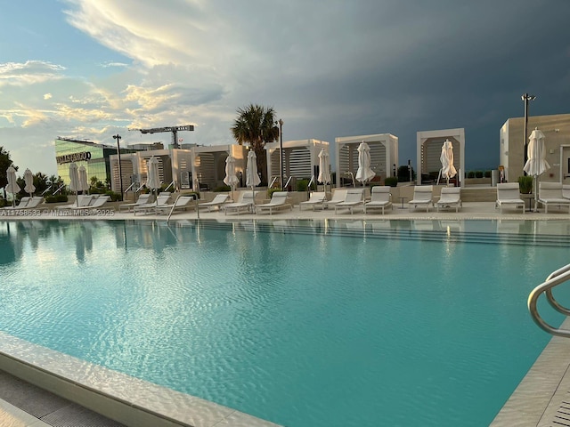 view of swimming pool with a patio area