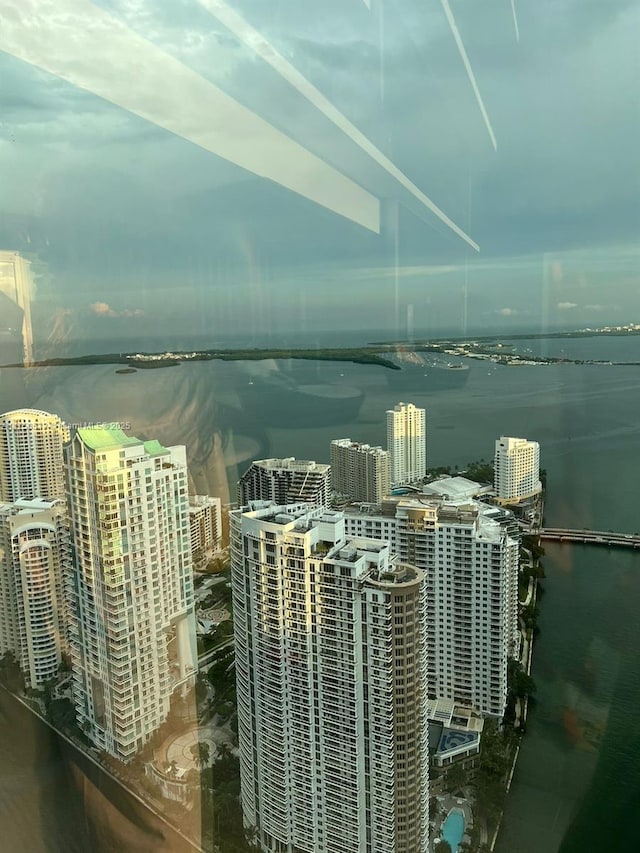 bird's eye view with a water view and a city view