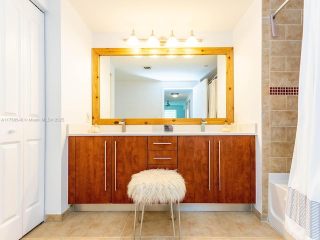 full bath featuring double vanity, shower / bath combo, tile patterned flooring, and visible vents