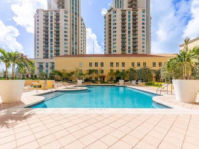 pool with a patio area