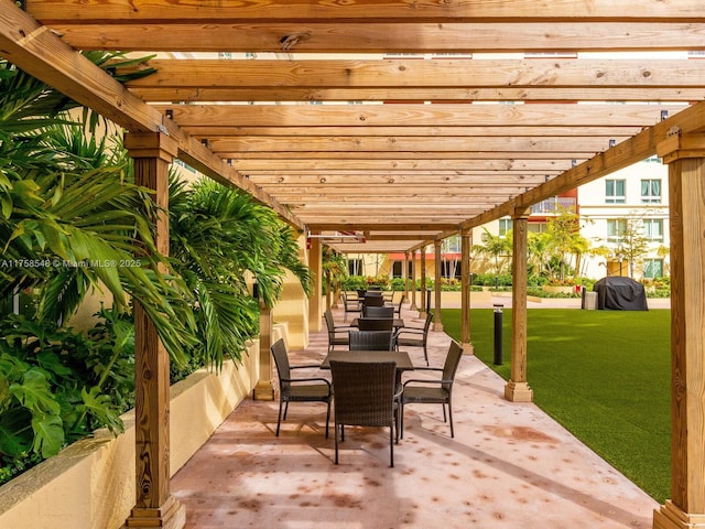 view of patio with outdoor dining area, a grill, and a pergola