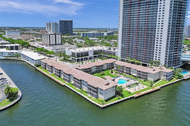 drone / aerial view with a water view and a city view