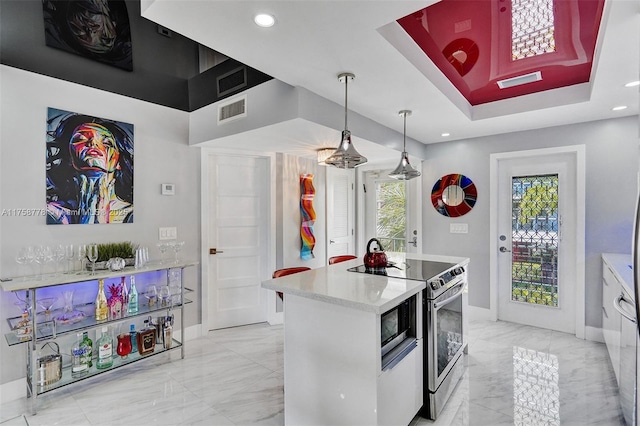 kitchen with visible vents, a center island, marble finish floor, stainless steel range with electric stovetop, and pendant lighting