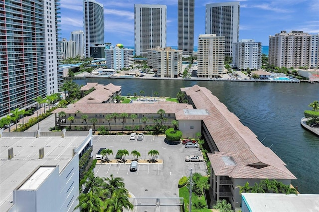 bird's eye view featuring a water view and a view of city