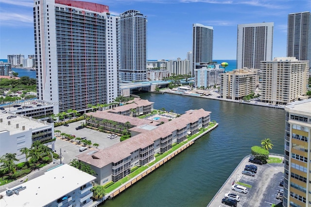 aerial view featuring a water view and a city view