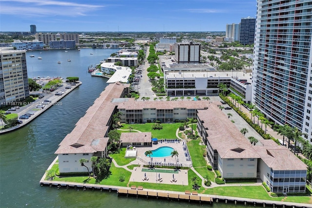 bird's eye view featuring a view of city and a water view