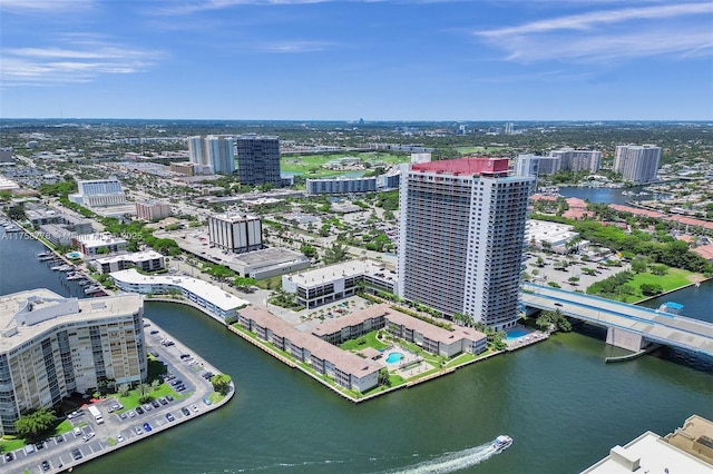 aerial view featuring a city view and a water view