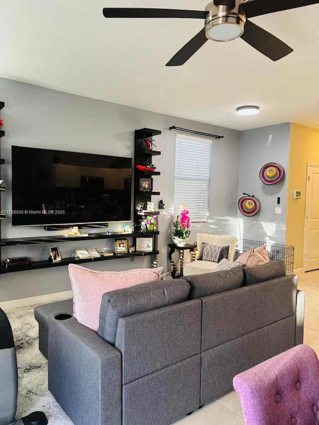 tiled living room featuring ceiling fan