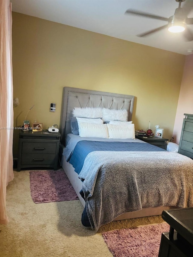 bedroom featuring carpet floors and a ceiling fan