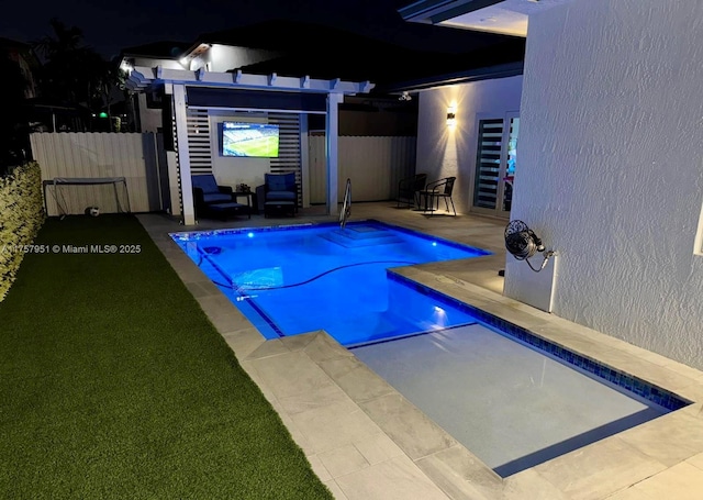 view of pool featuring fence and a patio area