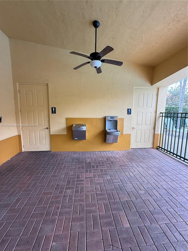 view of patio with ceiling fan