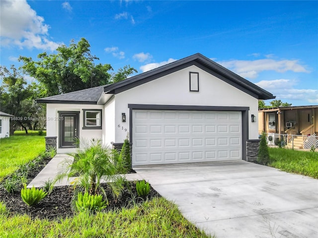 single story home featuring an attached garage, a shingled roof, stucco siding, concrete driveway, and stone siding