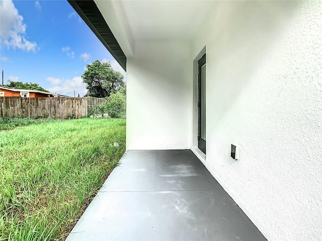 view of patio with fence