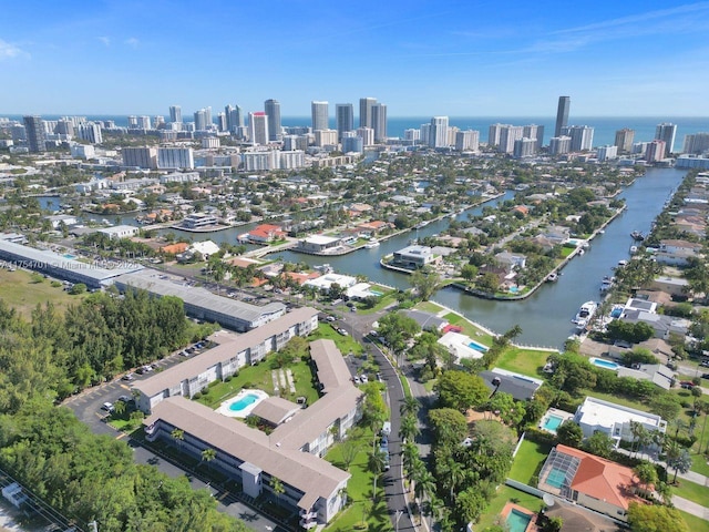 aerial view featuring a water view and a view of city