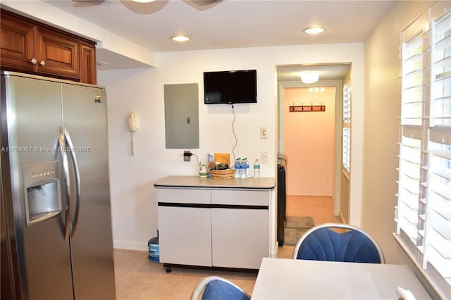 3970 Oaks Clubhouse Dr Unit 307, Pompano Beach, FL 33069 - kitchen with stainless steel refrigerator with ice dispenser, electric panel, brown cabinets, recessed lighting, and light tile patterned flooring