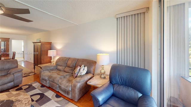 3970 Oaks Clubhouse Dr Unit 307, Pompano Beach, FL 33069 - living room with ceiling fan, wood finished floors, and a textured ceiling