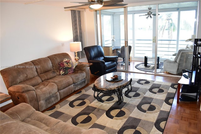 3970 Oaks Clubhouse Dr Unit 307, Pompano Beach, FL 33069 - living area with a ceiling fan and healthy amount of natural light