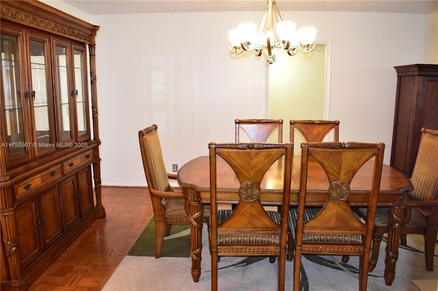 3970 Oaks Clubhouse Dr Unit 307, Pompano Beach, FL 33069 - dining area featuring a chandelier
