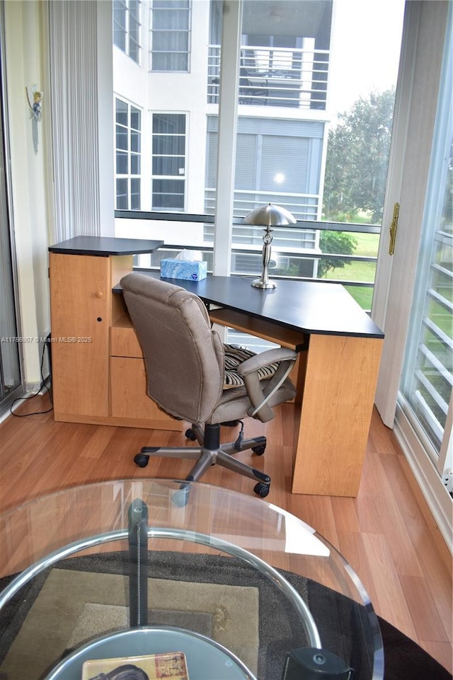 3970 Oaks Clubhouse Dr Unit 307, Pompano Beach, FL 33069 - office space featuring light wood-type flooring and healthy amount of natural light