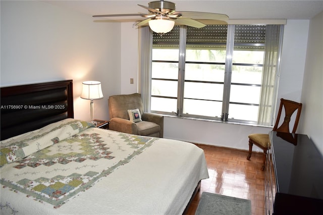 3970 Oaks Clubhouse Dr Unit 307, Pompano Beach, FL 33069 - bedroom featuring a ceiling fan