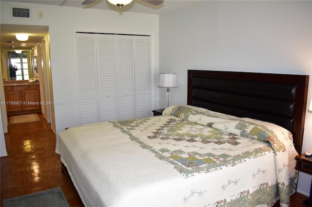 3970 Oaks Clubhouse Dr Unit 307, Pompano Beach, FL 33069 - bedroom featuring a closet and ceiling fan