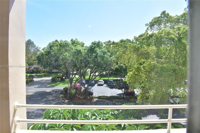 3970 Oaks Clubhouse Dr Unit 307, Pompano Beach, FL 33069 - view of yard featuring a balcony