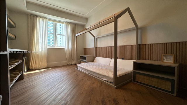 20000 E Country Club Dr Unit 1016, Aventura, FL 33180 - bedroom featuring baseboards and wood finished floors