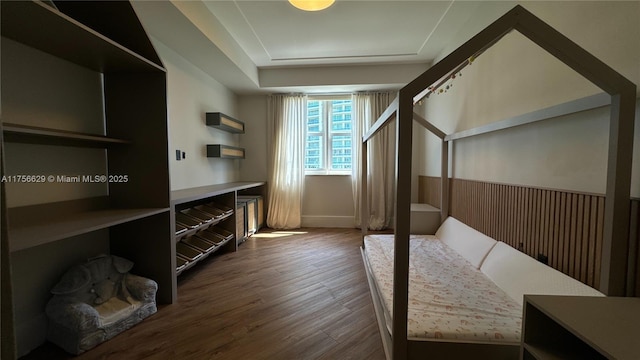 20000 E Country Club Dr Unit 1016, Aventura, FL 33180 - bedroom featuring a wainscoted wall and wood finished floors