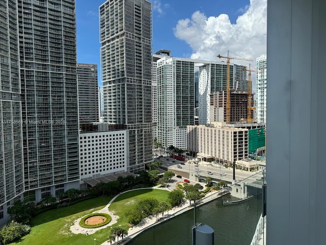 property's view of city with a water view