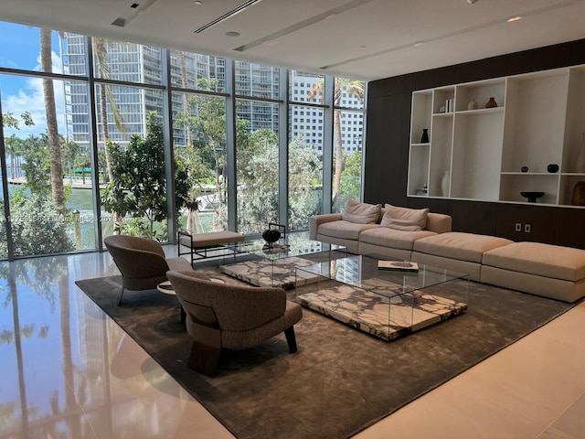 living room with floor to ceiling windows