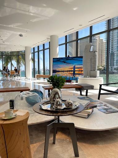 sunroom featuring a view of city