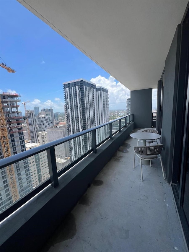 balcony featuring a city view