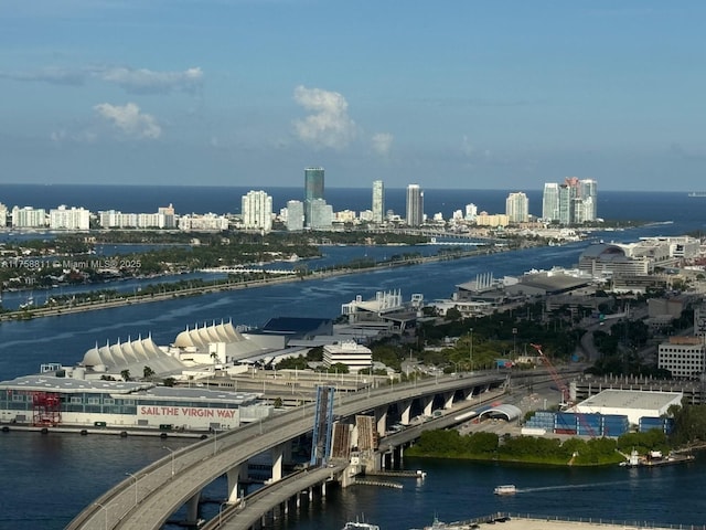 aerial view featuring a water view and a city view