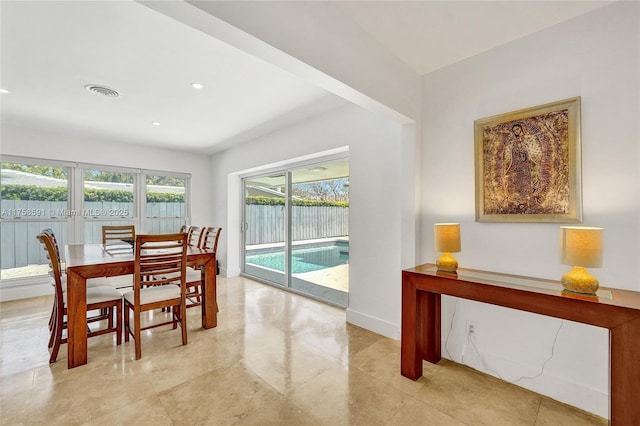 dining room featuring recessed lighting, visible vents, and baseboards