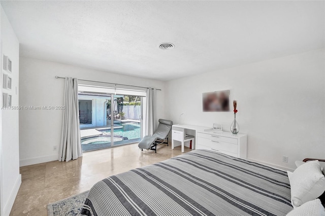 bedroom with access to exterior, visible vents, and baseboards