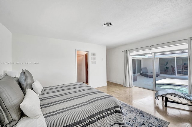 2817 NE 26th St, Fort Lauderdale, FL 33305 - bedroom featuring visible vents, access to outside, baseboards, and a textured ceiling