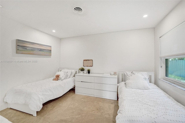 2817 NE 26th St, Fort Lauderdale, FL 33305 - bedroom with visible vents, recessed lighting, and light tile patterned flooring